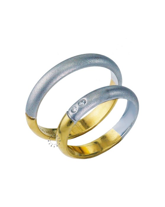 Wedding rings from 18ct Gold and Whitegold with Diamonds